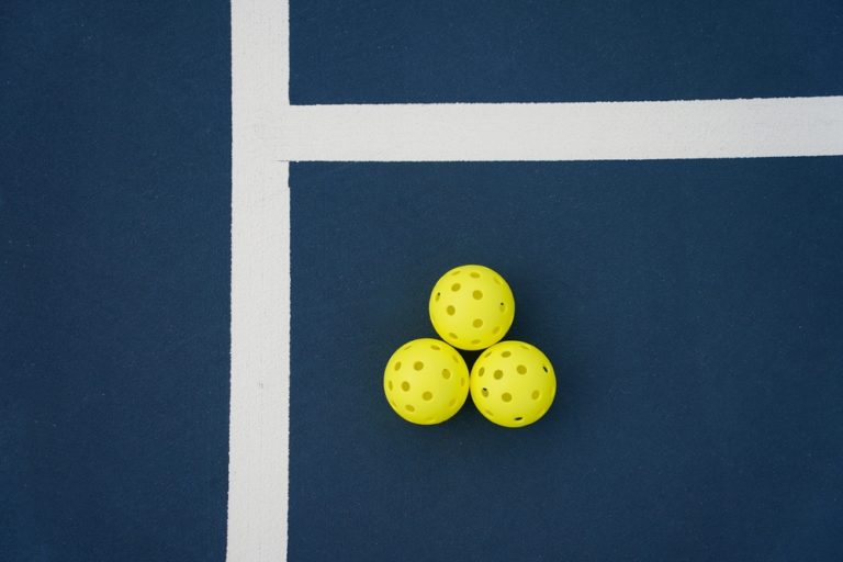 Why Do Outdoor Pickleballs Have Smaller Holes?
